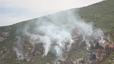 Fire burning down mountain Stock Footage 27815250