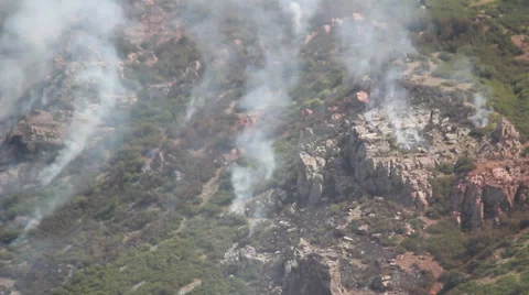 Fire burning down mountain Stock Footage 27815398