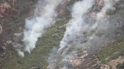 Fire burning down mountain Stock Footage 27816097
