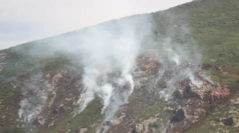 Fire burning down mountain Stock Footage 27816663