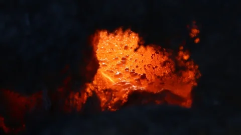 Fire is burning dry grass at spring time. Nature burns, bushes, tree branches Видео 128518754