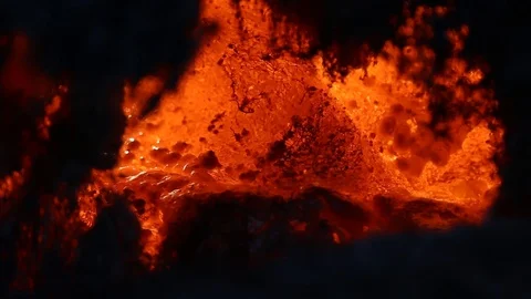 Fire is burning dry grass at spring time. Nature burns, bushes, tree branches Видео 128518890