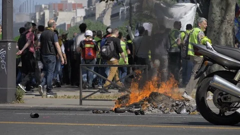 Fire burning during Yellow vests protest.Paris,France,20 April 2019 Stock Footage 108337204