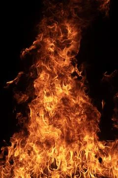 Fire burning. Fire on black background. Fiery fire for banner. Bright fire for Stock Photos