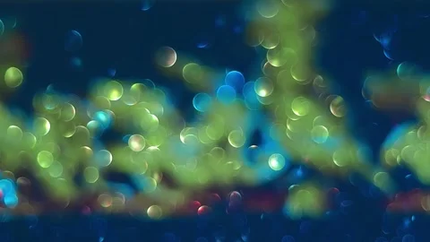 A fire burning in a fire bowl is projected onto a shiny, sparkling surface Stock Footage 313213826