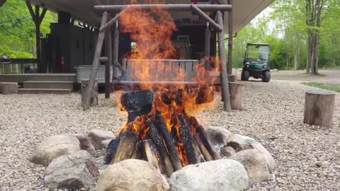 Fire burning in the fire pit on the backyard Stock Footage 212278023