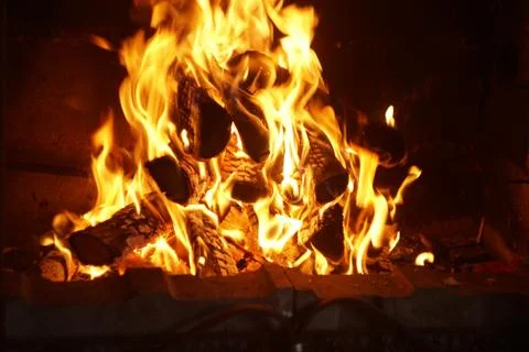 Fire burning in the fireplace close-up Stockfoto's