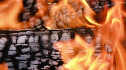 Fire is burning in the fireplace. Close up of some very hot charcoal burning in Stock Footage 156137935