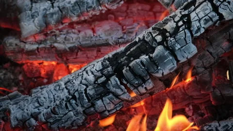 Fire is burning in the fireplace. Close up of some very hot charcoal burning in Stock Footage 159768848