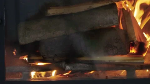 Fire burning in the fireplace. Dynamic rollover Stock Footage 169816371