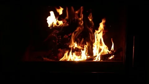 Fire burning in fireplace Stock Footage 79965558