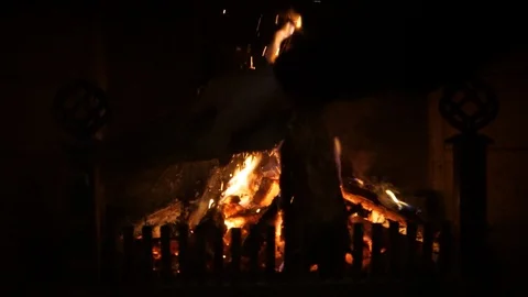 A fire burning in a fireplace Stock Footage 87991124