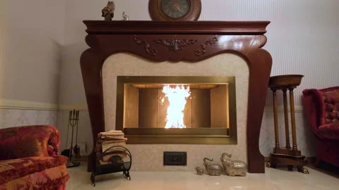 A fire is burning in the fireplace Video stock 164725683