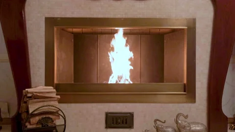 A fire is burning in the fireplace Video stock 164727642