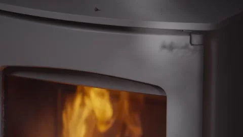 A fire is burning in a fireplace Stock Footage 302471651