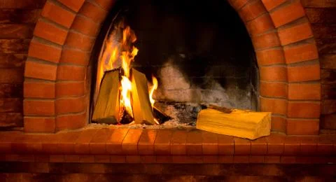 Fire burning in the fireplace Stock Photos