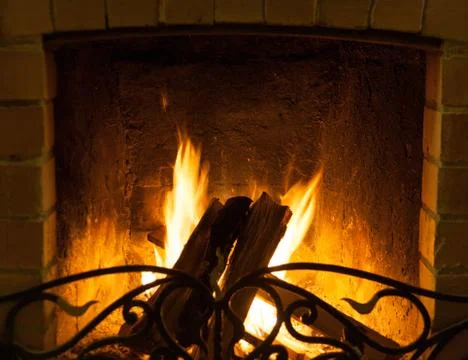 Fire burning in the fireplace Stock Photos