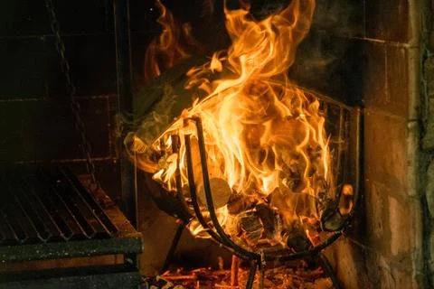 Fire burning in fireplace Stock Photos