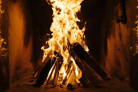 Fire burning in a fireplace  Stock Photos