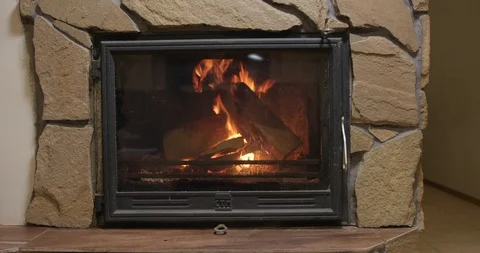 Fire burning in the fireplace, real time Video stock 121836362