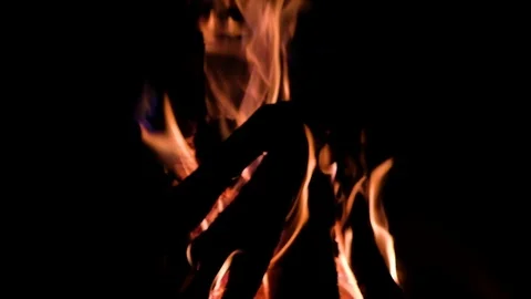 Fire burning in the fireplace. Slow motion blurred video of fire flames over  Stock Footage 92077381