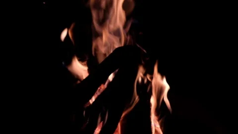 Fire burning in the fireplace. Slow motion blurred video of fire flames over  Stock Footage 92239695