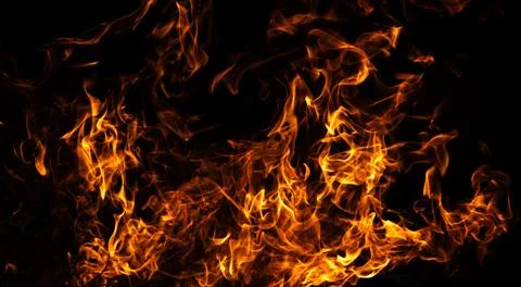 Fire burning flame texture. Fire intense heat glow. Fire abstract energy moti Stock Photos