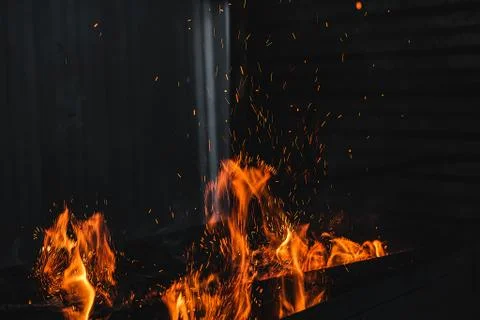 Fire burning on the grill 스톡 사진