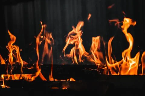Fire burning on the grill 스톡 사진