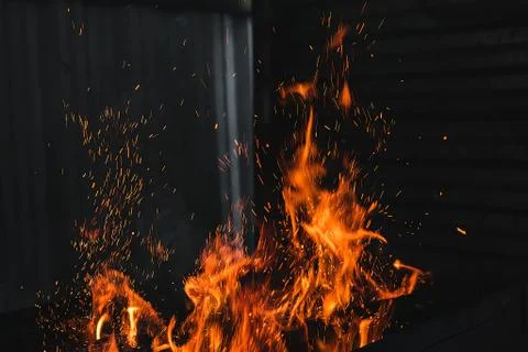 Fire burning on the grill 写真素材