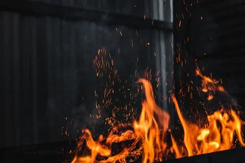 Fire burning on the grill 스톡 사진