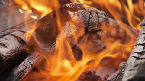 Fire burning in grill. Real fireplace full of wood and fire. Beautiful motion of Stock Footage 150137659