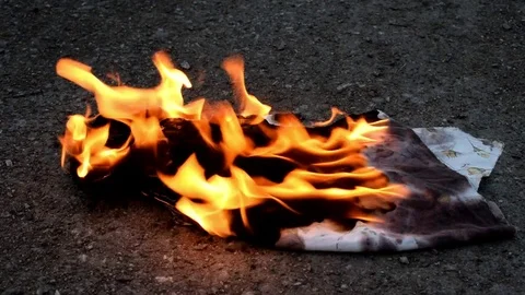 Fire burning on the ground Stock Footage 78876809