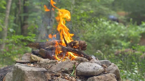 Fire burning high in a stove. Open grill. Picnic Stock Footage 113058918
