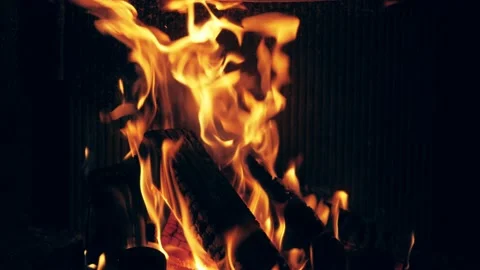 Fire is burning in home fireplace background. Hot orange flames Bonfire in house Stock Footage 146447536