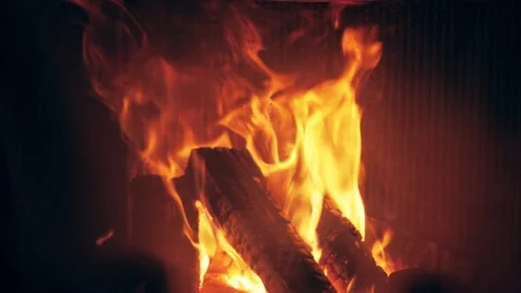 Fire is burning in home fireplace background. Hot orange flames Bonfire in house Stock Footage 146447866