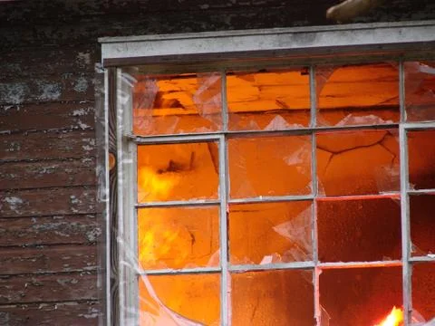 Fire Burning inside Home Stock Photos