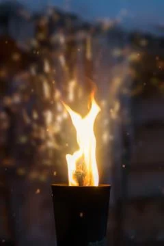Fire burning inside metal torch Stock Photos