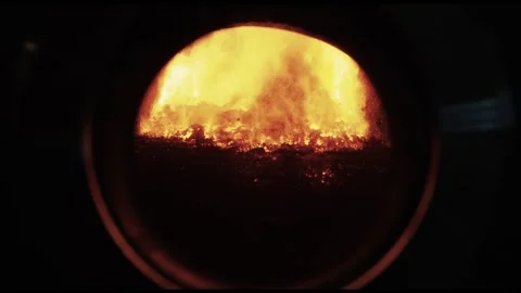 Fire Burning Inside Sight Glass of Biomass Furnace, Close Up Shot Video stock 341438186