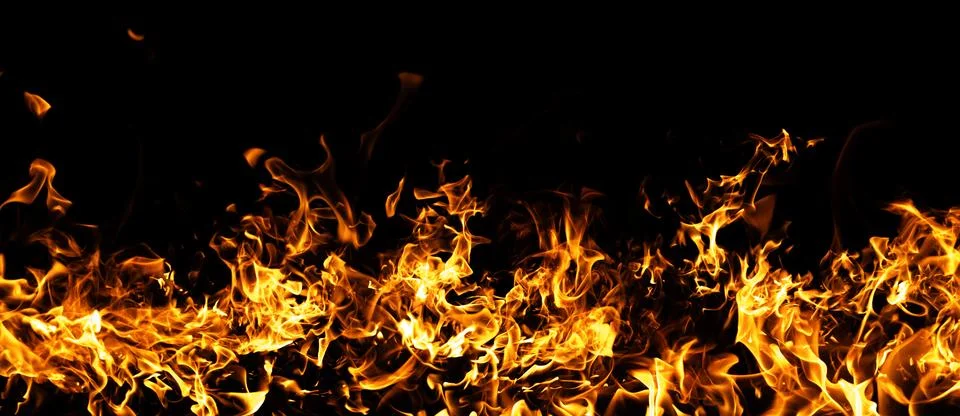 Fire burning motion pattern. Fire intense blaze effect. Fire dramatic heat waves Stock Photos