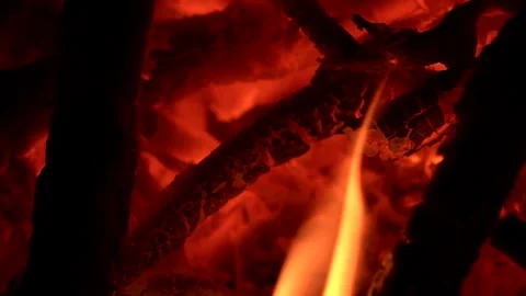 Fire burning in night. Loopable, yellow and orange color flame giving. Stock Footage 251426904