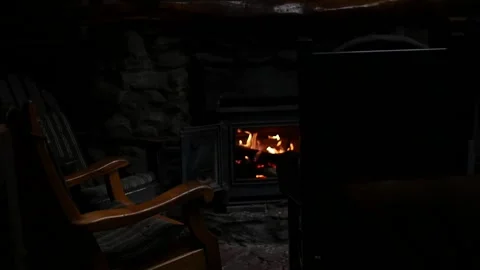 Fire burning in an old wood burning cast iron stove Stock Footage 150478656