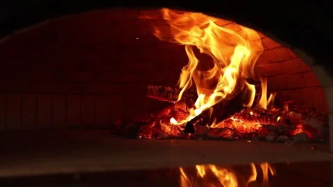 A fire is burning in the pizza oven Stock Footage 262529863