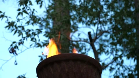 Fire Burning in red clay Chiminea Fireplace Stock Footage 130969633