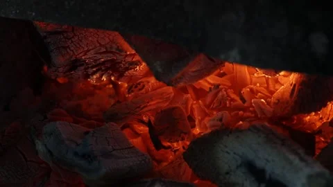 The fire is burning red-hot charcoal fire closeup video Stock Footage 130770486
