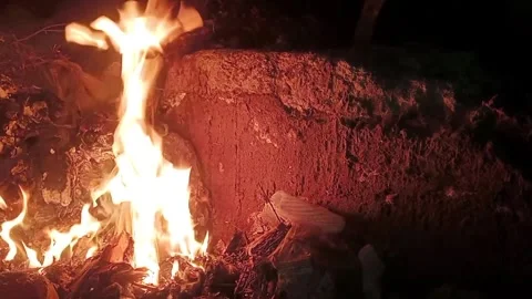 Fire burning rubbish in the dark 9 Stock Footage 327386856