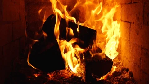 Fire burning with slow motion flames in stove Stock Footage 107853644
