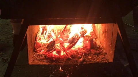 Fire burning in a small fireplace Stock Footage 101438733