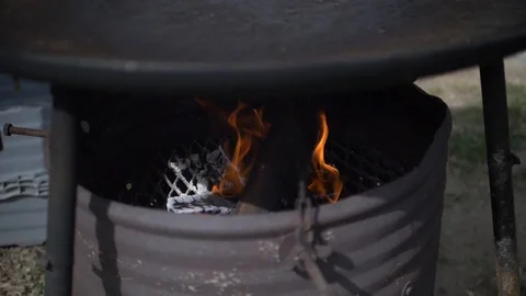 Fire burning under griddle Stock Footage 108564181