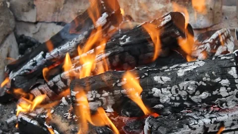 Fire is burning. Warmth and home comfort. Flames in the open grill Stock Footage 146234189